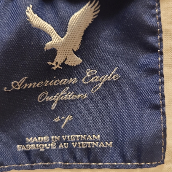 White long sleeve hooded Tee shirt with pocket for hands on front. - Picture 5 of 5